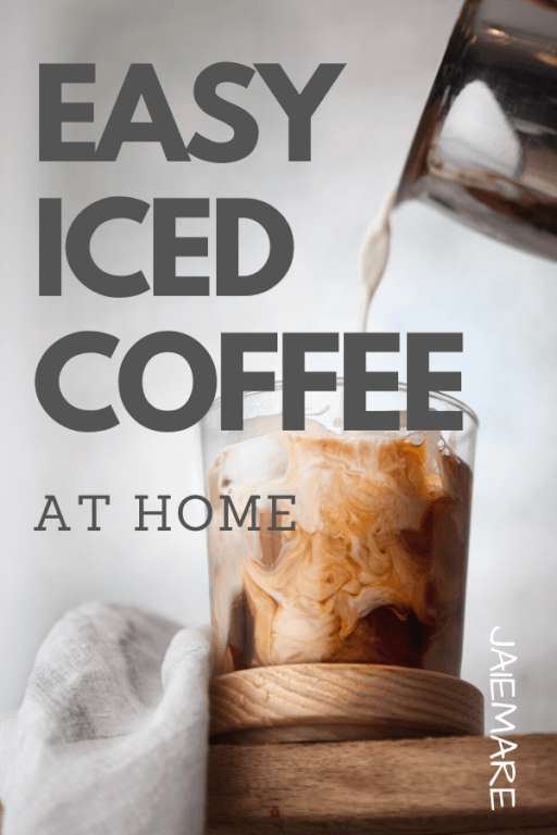 Heavy cream being poured in iced coffee at home.
