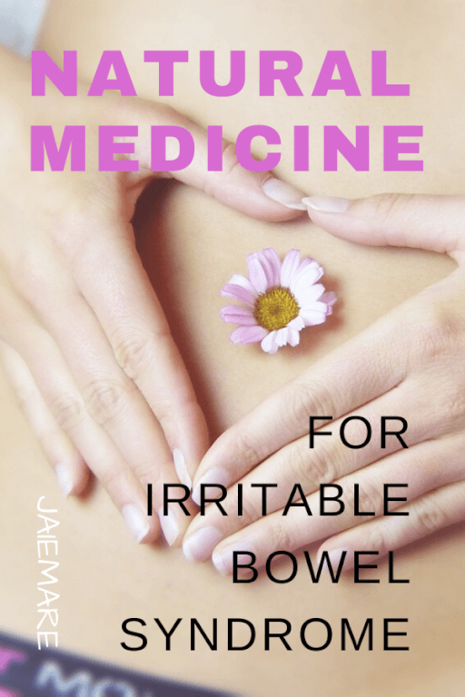 Woman with irritable bowel syndrome making a heart on her stomach