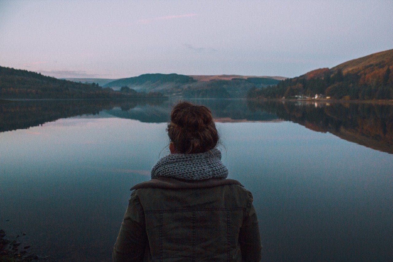 woman with a chronic illness reflecting