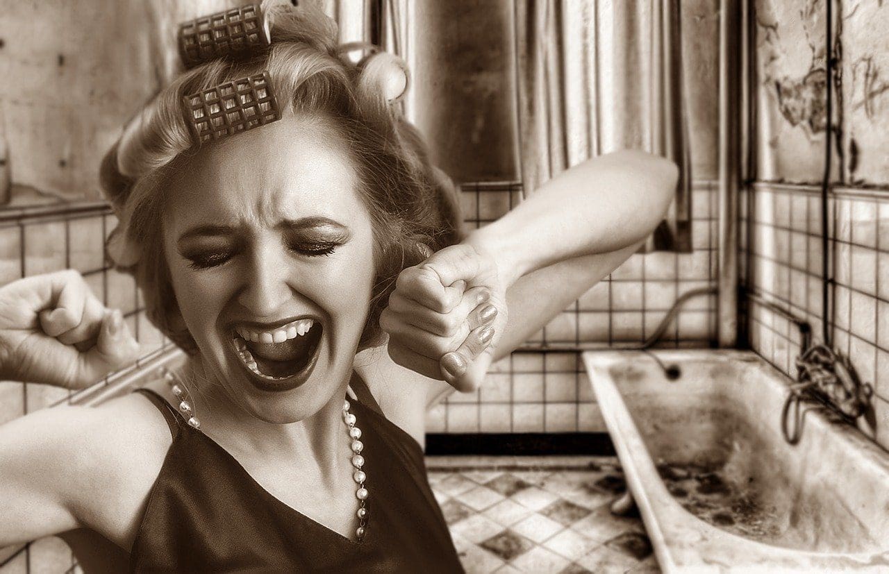 women screaming in frustration over hair loss