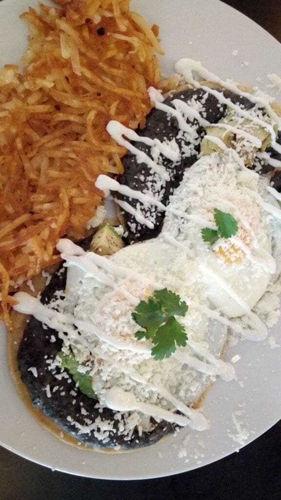 Image of breakfast food of hash browns and eggs.